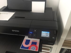 A card comes off the printer