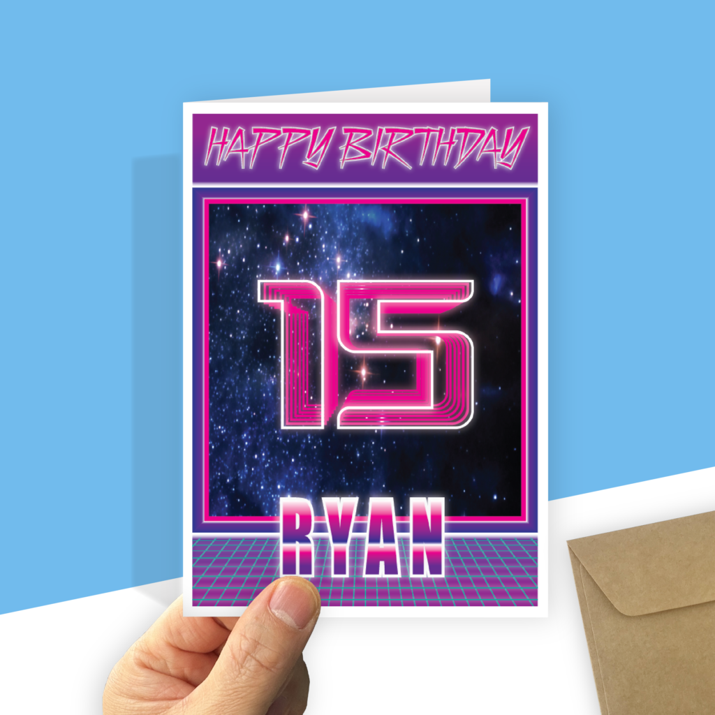 15th birthday card held against a blue background.