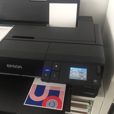 A card comes off the printer