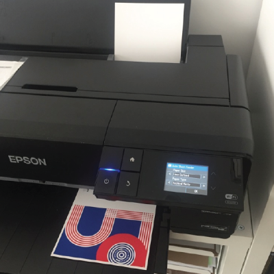 A card comes off the Epsom Surecolor P800 printer